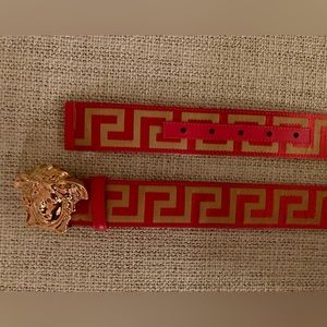 Versace red, gold-tone La Greca print Medusa head buckle belt.
